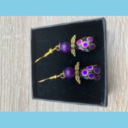 Glasengel med sugillit hoved