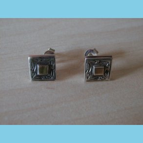 Slvrestik med 14 K Guld