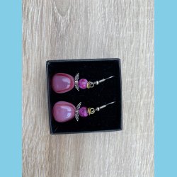 Englereringe i glas med et Jaspis hoved