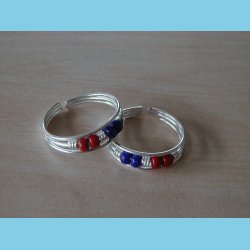 T�ring med bl� og r�d sten